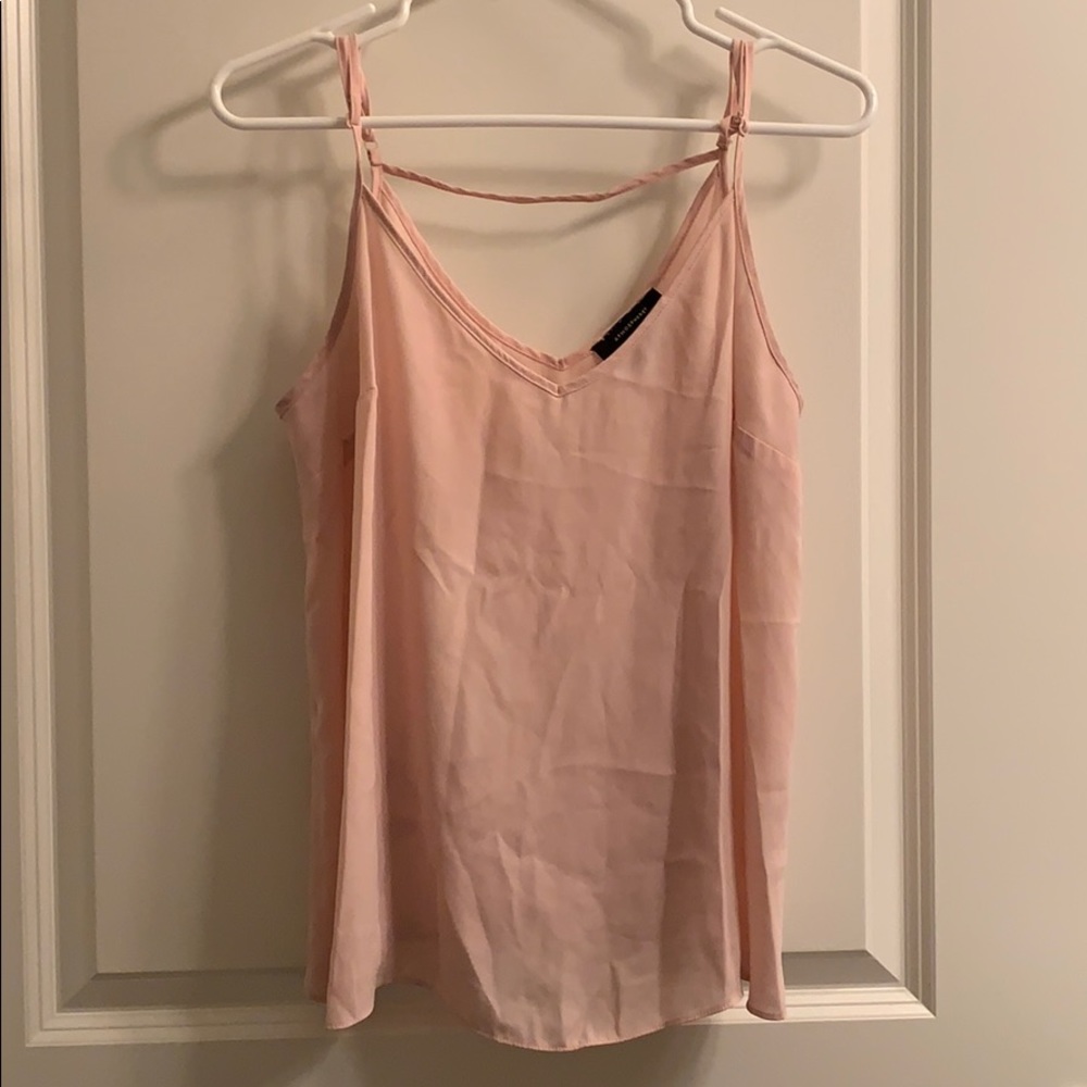 Light pink sleeveless blouse